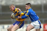 12 March 2005; David Russell, Clare, in action against Shane Mulligan, Longford. Allianz National Football League, Division 2A, Clare v Longford, Cusack Park, Ennis, Co. Clare. Picture credit; Ray McManus / SPORTSFILE