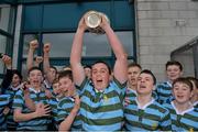 11 December 2013; St. Gerard’s School captain Daniel Power lifts the cup as his team-mates celebrate. Leinster Schools Junior Section B League Final, St. Gerard’s School v Newbridge College, Templeville Road, Dublin. Picture credit: Matt Browne / SPORTSFILE