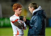 11 December 2013; Kieran McGeeney, Armagh assistant manager,right, speaks to Kyle Carragher before the game. O'Fiach Cup, Armagh v Derry, Athletic Grounds, Armagh. Picture credit: Oliver McVeigh / SPORTSFILE