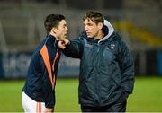 11 December 2013; Kieran McGeeney, Armagh assistant manager,right, speaks to Aiden Forker before the game. O'Fiach Cup, Armagh v Derry, Athletic Grounds, Armagh. Picture credit: Oliver McVeigh / SPORTSFILE