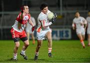 11 December 2013; Ciaran McKeever, Armagh, in action against Carlus McWilliams, Derry. O'Fiach Cup, Armagh v Derry, Athletic Grounds, Armagh. Picture credit: Oliver McVeigh / SPORTSFILE