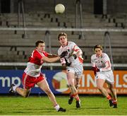11 December 2013; Kieran Toner, Armagh, in action against James Kielt, Derry. O'Fiach Cup, Armagh v Derry, Athletic Grounds, Armagh. Picture credit: Oliver McVeigh / SPORTSFILE