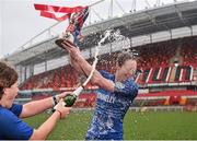14 December 2013; Leinster captain Marie Louise Reilly gets sprayed with champagne by team-mate Jenny Murphy after lifting the cup. Women's Interprovincial, Munster v Leinster, Thomond Park, Limerick. Picture credit: Barry Cregg / SPORTSFILE