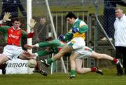 13 March 2005; John Reynolds, Offaly, has his shot blocked by David Heaney and goalkeeper David Clarke, Mayo. Allianz National Football League, Division 1A, Offaly v Mayo, O'Connor Park, Tullamore, Co. Offaly. Picture credit; David Maher / SPORTSFILE