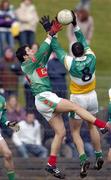 13 March 2005; Alan McNamee, Offaly, in action against James Gill, Mayo. Allianz National Football League, Division 1A, Offaly v Mayo, O'Connor Park, Tullamore, Co. Offaly. Picture credit; David Maher / SPORTSFILE