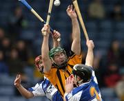 13 March 2005; Jimmy Coogan, Kilkenny, in action against Brian Campion, left, and Packie Cuddy, Laois. Allianz National Hurling League, Division 1A, Laois v Kilkenny, O'Moore Park, Portlaoise, Co. Laois. Picture credit; Pat Murphy / SPORTSFILE