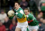13 March 2005; Karol Slattery, Offaly, in action against Andy Moran, Mayo. Allianz National Football League, Division 1A, Offaly v Mayo, O'Connor Park, Tullamore, Co. Offaly. Picture credit; David Maher / SPORTSFILE
