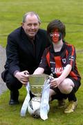 14 March 2005; Padraig Corkery, head of sporsorship eircom, with Daniel Keogh, age 11, from Longford, wearing the Longford Town colours at the launch of the 2005 eircom League season. Coach House, Dublin Castle, Dublin. Picture credit; David Maher / SPORTSFILE