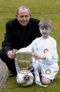 14 March 2005; Padraig Corkery, head of sporsorship eircom, with Mark Webster, age 8 from Ballybofey, Co. Donegal, wearing the Finn Harps colours at the launch of the 2005 eircom League season. Coach House, Dublin Castle, Dublin. Picture credit; David Maher / SPORTSFILE