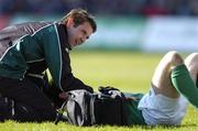 12 March 2005; Cameron Steele, Ireland, attends to an injured Geordan Murphy. RBS Six Nations Championship 2005, Ireland v France, Lansdowne Road, Dublin. Picture credit; Brendan Moran / SPORTSFILE