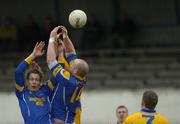 12 March 2005; Longford players Niall Sheridan, 14, and Brian Kavanagh, vie for possession with Clare's Brian Considine. Allianz National Football League, Division 2A, Clare v Longford, Cusack Park, Ennis, Co. Clare. Picture credit; Ray McManus / SPORTSFILE