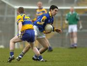 12 March 2005; Enda Ledwith, Longford, in action against Eoin Curtin, Clare. Allianz National Football League, Division 2A, Clare v Longford, Cusack Park, Ennis, Co. Clare. Picture credit; Ray McManus / SPORTSFILE