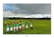 12 May 2013; David Lyons, right, gestures as the Cloughduv U6's and U8's assemble into a guard of honour for the teams before the game. Official Opening of New Cloughduv GAA Complex, Cork v Tipperary, Fr.O'Driscoll Park, Cloughduv, Co. Cork. Picture credit: Brendan Moran / SPORTSFILE