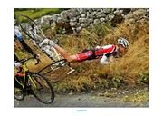 4 July 2013; Laurens Schumacher, Cycling Amsterdam, right, crashes during Stage 3 on the 2013 Junior Tour of Ireland, Ennis - Ennis, Co. Clare. Picture credit: Stephen McMahon / SPORTSFILE