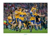 28 September 2013; Padraic Collins, 13, and Colm Galvin, 8, Clare celebrate with team-mates at the end of the game. GAA Hurling All-Ireland Senior Championship Final Replay, Cork v Clare, Croke Park, Dublin. Picture credit: David Maher / SPORTSFILE
