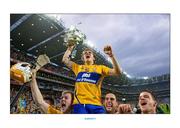 28 September 2013; Clare goalscorer Shane O'Donnell is lifted by his team-mates as they celebrate with the Liam MacCarthy cup after the game. GAA Hurling All-Ireland Senior Championship Final Replay, Cork v Clare, Croke Park, Dublin. Picture credit: Brendan Moran / SPORTSFILE