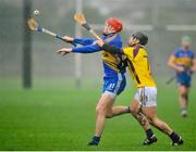 14 December 2013; Donagh Maher, Tipperary, in action against James Tonks, Wexford. Senior HurlingChallenge Match, Tipperary v Wexford. Clonmel Sportsfield, Clonmel, Co. Tipperary. Picture credit: Pat Murphy / SPORTSFILE