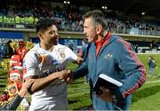 14 December 2013; Munster head coach Rob Penney exchanges a handshake with Lifeimi Mafi, Perpignan, after the game. Heineken Cup 2013/14, Pool 6, Round 4, Perpignan v Munster. Stade Aimé Giral, Perpignan, France. Picture credit: Diarmuid Greene / SPORTSFILE