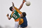15 December 2013; Owen Carroll, Offaly, beats Meath goalkeeper Conor McHugh to score the side's third goal. Fitzsimons Cup Final, Meath v Offaly, Grangegodden, Kells, Co. Meath. Picture credit: Ramsey Cardy / SPORTSFILE