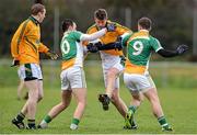 15 December 2013; Conor Sheridan, Meath, in action against Graham Guilfoil, left, and Johnny Brickland, Offaly. Fitzsimons Cup Final, Meath v Offaly, Grangegodden, Kells, Co. Meath. Picture credit: Ramsey Cardy / SPORTSFILE
