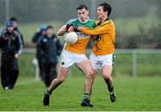 15 December 2013; Owen Carroll, Offaly, in action against Eoghan Harrington, Meath. Fitzsimons Cup Final, Meath v Offaly, Grangegodden, Kells, Co. Meath. Picture credit: Ramsey Cardy / SPORTSFILE