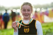15 December 2013; Sarah Healy, from Blackrock Athletic Club, Co. Dublin, celebrates with her medal after winning the Girls under-13 2500m at the Woodie’s DIY National Novice & Even Age Cross Country Championships. WIT Sports Campus, Carriganore, Co. Waterford. Picture credit: Matt Browne / SPORTSFILE