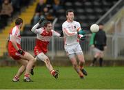 15 December 2013; Stefan Forker, Armagh, in action against Mickey McShane, Derry. O'Fiach Cup Final, Armagh v Derry, Crossmaglen, Co. Armagh. Photo by Sportsfile