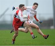 15 December 2013; Declan Mullan, Derry, in action against Charlie Vernon, Armagh. O'Fiach Cup Final, Armagh v Derry, Crossmaglen, Co. Armagh. Photo by Sportsfile