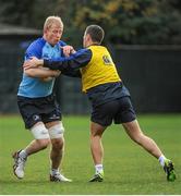 16 December 2013; Leinster's Leo Cullen is tackled by John Cooney during squad training ahead of their Celtic League 2013/14, Round 10, match against Edinburgh on Friday. Leinster Rugby Squad Training & Press Briefing, Rosemount, UCD, Belfield, Dublin. Picture credit: Piaras Ó Mídheach / SPORTSFILE