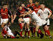 18 March 2005; John Kelly, Munster, is tackled by Paddy Wallace, Ulster. Celtic League 2004-2005, Pool 1, Munster v Ulster, Musgrave Park, Cork. Picture credit; Matt Browne / SPORTSFILE
