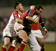 18 March 2005; Rob Herderson, Munster, is tackled by Andy Ward, left, and Paul Stewmetz, Ulster. Celtic League 2004-2005, Pool 1, Munster v Ulster, Musgrave Park, Cork. Picture credit; Matt Browne / SPORTSFILE