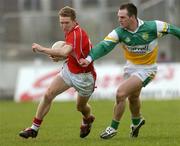 20 March 2005; Conor McCarthy, Cork, in action against Scott Brady, Offaly. Allianz National Football League, Division 1A, Offaly v Cork, O'Connor Park, Tullamore, Co. Offaly. Picture credit; David Maher / SPORTSFILE