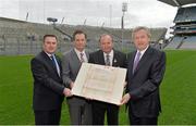18 December 2013; Pictured are, from left to right, Peter McKenna, Croke Park Stadium Director, David Dineen, Uachtarán Chumann Lúthchleas Gael Liam Ó Néill and Ard Stiúrthoir of the GAA Paraic Duffy holding the original Deeds of Croke Park during an event to mark the 100th Anniversary of the Deeds of Croke Park being presented to the GAA by Frank Dineen. Croke Park, Dublin. Picture credit: Matt Browne / SPORTSFILE