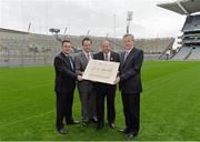 18 December 2013; Pictured are, from left to right, Peter McKenna, Croke Park Stadium Director, David Dineen, Uachtarán Chumann Lúthchleas Gael Liam Ó Néill and Ard Stiúrthoir of the GAA Paraic Duffy holding the original Deeds of Croke Park during an event to mark the 100th Anniversary of the Deeds of Croke Park being presented to the GAA by Frank Dineen. Croke Park, Dublin. Picture credit: Matt Browne / SPORTSFILE