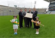 18 December 2013; Pictured are, from left to right, Peter McKenna, Croke Park Stadium Director, David Dineen, Uachtarán Chumann Lúthchleas Gael Liam Ó Néill and Ard Stiúrthoir of the GAA Paraic Duffy with eight year old Cayden Molloy, left, and seven year old Lennox Fitzsimons holding the original Deeds of Croke Park during an event to mark the 100th Anniversary of the Deeds of Croke Park being presented to the GAA by Frank Dineen. Croke Park, Dublin. Picture credit: Matt Browne / SPORTSFILE