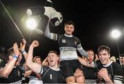 18 December 2013: Newbridge College's Tom Dunne, is lifted by Conor Doyle, left, Jonathan Phelan and Tom Brady, right. Leinster Senior League Section B Final, Cistercian College Roscrea v Newbridge College, Donnybrook Stadium, Donnybrook, Dublin. Picture credit: Ray Lohan / SPORTSFILE