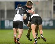 18 December 2013: Simon Meagher, Cistercian College Roscrea, in action against Conor Doyle, left, and Joe D'Arcy, Newbridge College. Leinster Senior League Section B Final, Cistercian College Roscrea v Newbridge College, Donnybrook Stadium, Donnybrook, Dublin. Picture credit: Ray Lohan / SPORTSFILE