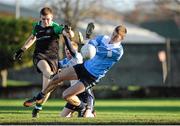 19 December 2013; Kevin Creasey, St Benildus College, puts the ball past Keith Kelly, despite being tackled by Tadhg Forde, Maynooth Post Primary to score a point. Dublin Schools Senior “A” Football Final, St Benildus College v Maynooth Post Primary. O'Toole Park, Crumlin, Dublin. Picture credit: Piaras Ó Mídheach / SPORTSFILE