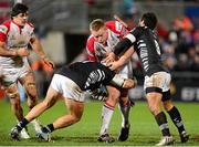 20 December 2013; Tom Court, Ulster, is tackled by Matias Aguero and Alberto Chillon, Zebre. Celtic League 2013/14, Round 10, Ulster v Zebre, Ravenhill Park, Belfast, Co. Antrim. Picture credit: Oliver McVeigh / SPORTSFILE