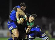 21 December 2013; Jake Heenan, Connacht, is tackled by Samuel Parry and Cory Hill, Newport Gwent Dragons. Celtic League 2013/14, Round 10, Connacht v Newport Gwent Dragons, Sportsground, Galway. Picture credit: Ray Ryan / SPORTSFILE