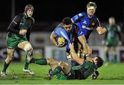 21 December 2013; Tobey Faletau, Newport Gwent Dragons, is tackled by Jake Heenan, Connacht. Celtic League 2013/14, Round 10, Connacht v Newport Gwent Dragons, Sportsground, Galway. Picture credit: Ray Ryan / SPORTSFILE