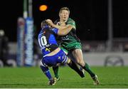 21 December 2013; Eoin Griffin, Connacht, is tackled by Jason Tovey, Newport Gwent Dragons. Celtic League 2013/14, Round 10, Connacht v Newport Gwent Dragons, Sportsground, Galway. Picture credit: Ray Ryan / SPORTSFILE