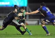 21 December 2013; Robbie Henshaw, Connacht, is tackled by Andrew Coombs and Cory Hill, Newport Gwent Dragons. Celtic League 2013/14, Round 10, Connacht v Newport Gwent Dragons, Sportsground, Galway. Picture credit: Ray Ryan / SPORTSFILE