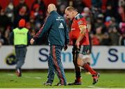 21 December 2013; BJ Botha, Munster, leaves the pitch, with team masseur Dave Revins, after picking up an injury. Celtic League 2013/14, Round 10, Munster v Scarlets, Musgrave Park, Cork. Picture credit: Diarmuid Greene / SPORTSFILE