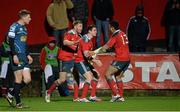 21 December 2013; Ronan O'Mahony, Munster, centre, is congratulated by team-mates Ivan Dineen, left, and Casey Laulala after scoring his side's first and only try of the game. Celtic League 2013/14, Round 10, Munster v Scarlets, Musgrave Park, Cork. Picture credit: Diarmuid Greene / SPORTSFILE