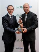 21 December 2013; Former Republic of Ireland international Paul McGrath is presented with the  RTÉ / Irish Sports Council Hall of Fame award by Republic of Ireland manager Martin O'Neill at the RTÉ Sports Awards 2013. RTÉ Studios, Donnybrook, Dublin. Photo by Sportsfile