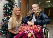 23 December 2013; Claudine Keane with, 15 year old, Lisa Kinlan, from Dublin, during a visit to Temple Street Children's University Hospital, Temple Street, Dublin. Picture credit: David Maher / SPORTSFILE