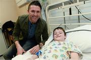 23 December 2013; Republic of Ireland international Robbie Keane with, 10 year old, Ciaran Curley, from Ballinasloe, Co. Galway, during a visit to Temple Street Children's University Hospital, Temple Street, Dublin. Picture credit: David Maher / SPORTSFILE