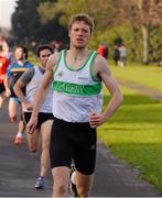 25 December 2013; Kevin Moriarty, of the host club Raheny Shamrock A.C., leads Conor Dooney, 2nd, Kieran Kelly, 3rd, and almost 1,000 runners to win the 'Billy Peppard Perpetual Cup, for the Christmas Morning Race - in aid of GOAL in St Annes Park, Raheny, Dublin. Picture credit: Ray McManus / SPORTSFILE