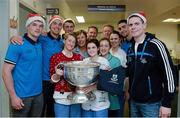 25 December 2013; Members of the Dublin football team, Eric Lowndes, TomÃ¡s Brady, Cormac Costello, manager Jim Gavin, selector Shane O'Hanlon, James McCarthy and captain Stephen Cluxton with nursing staff of St. Teresa's Ward, Elaine Jackson, Monica Cunningham, Orla Smith, Agnieszka Korczak and Orla Yourell, when the Dubs visited patients and staff at the National Kidney and Pancreas Transplation Unit, in Beaumont Hospital, Dublin. Picture credit: Ray McManus / SPORTSFILE